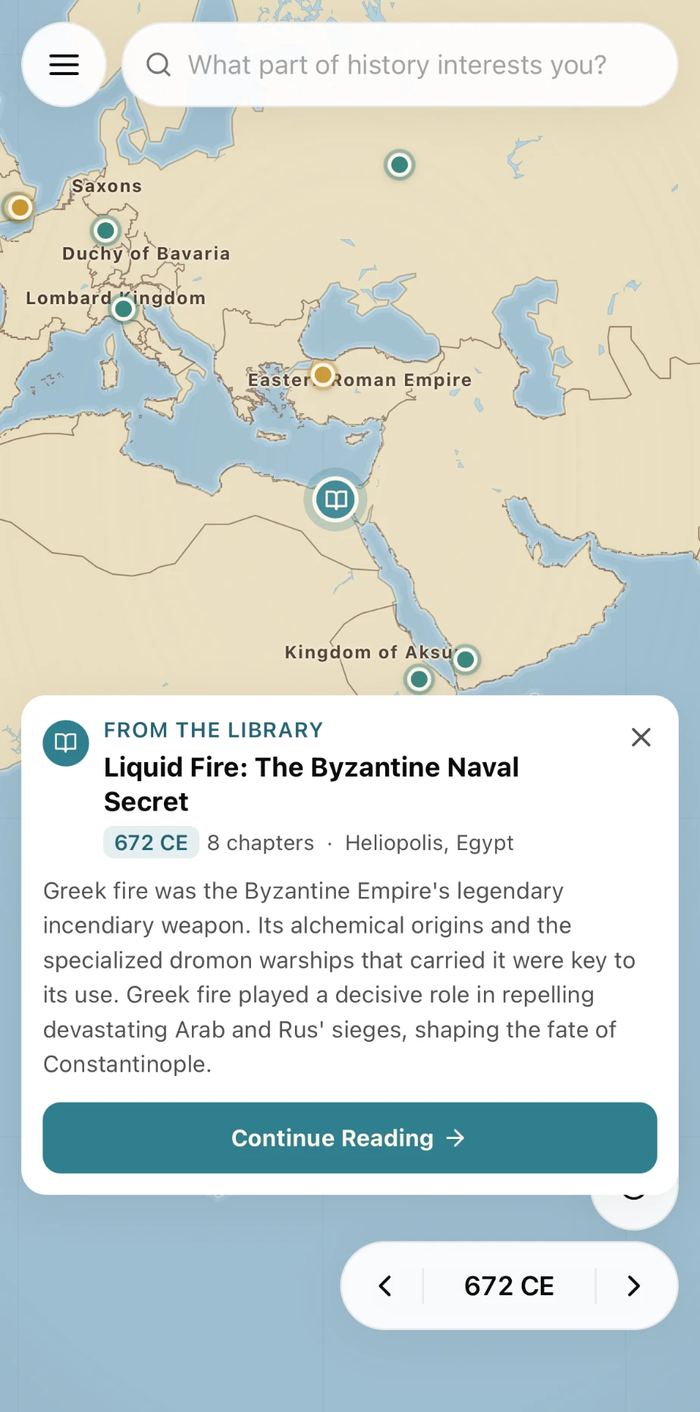 The Cartalore map at 672 CE over Europe and the Near East, labelled Saxons, Duchy of Bavaria, Lombard Kingdom, Eastern Roman Empire and Kingdom of Aksum, above a library card for the story Liquid Fire: The Byzantine Naval Secret, eight chapters, set in Heliopolis, Egypt, with a Continue Reading button.